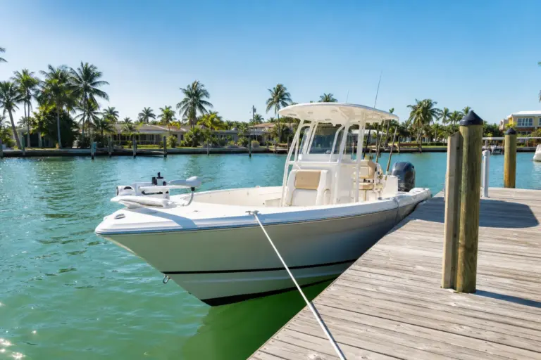 Center console fishing boat at marina dock