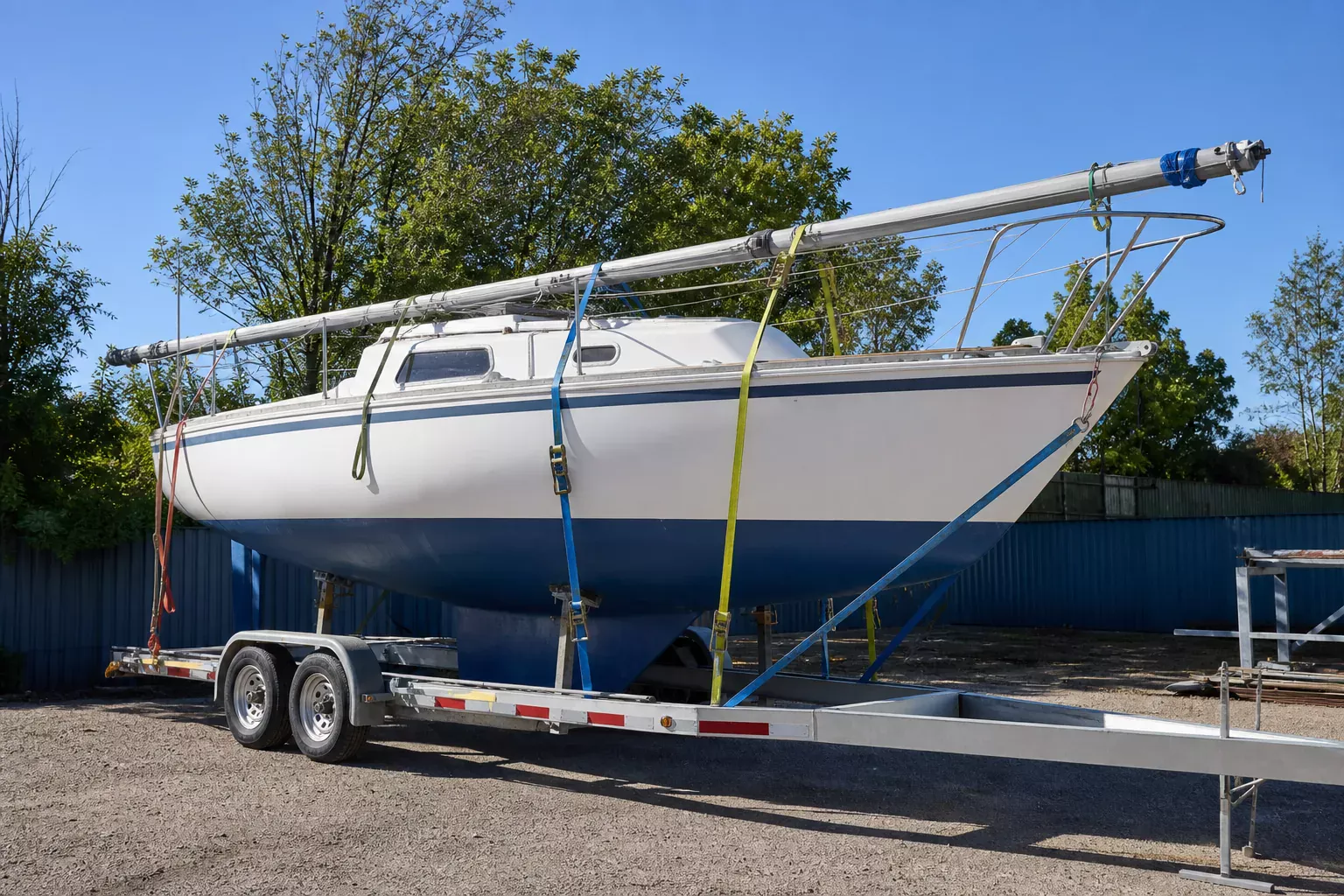 Sailboat with mast down on trailer